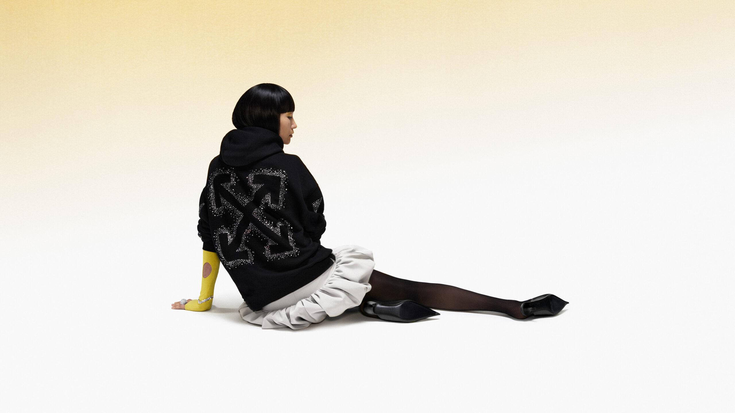 2025_ICONS_OF_JOY_OFF_WHITE_ON_MODEL_STILL_2_72dpi_rgb_16x9 (1)