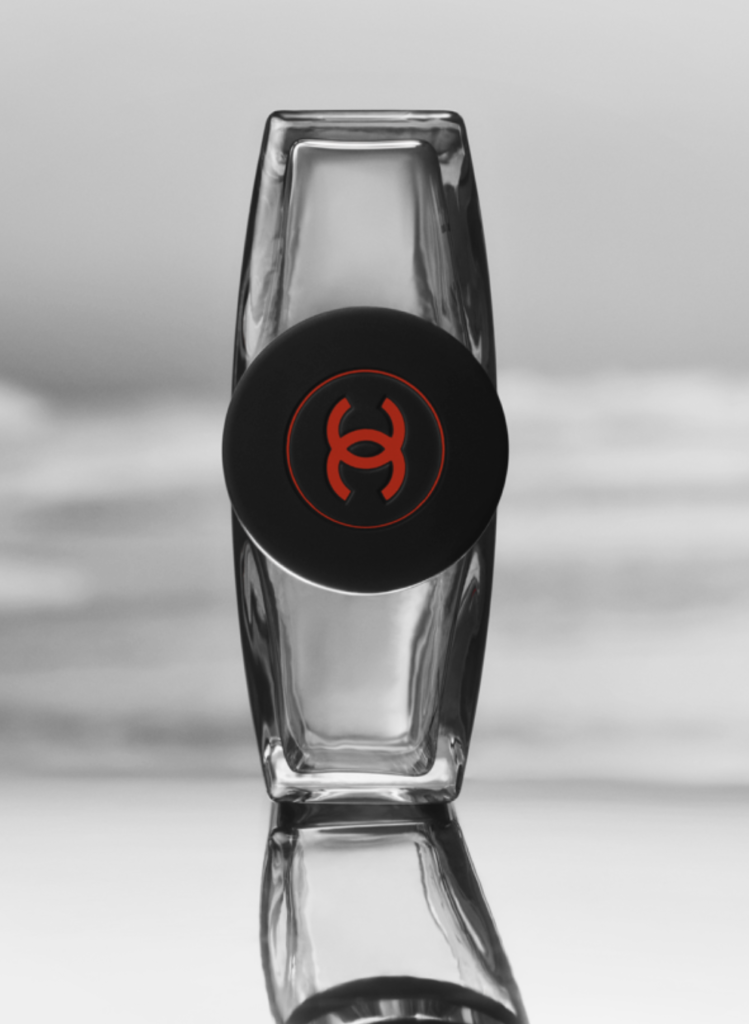 tapa negra de la botella de Allure